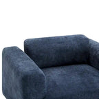 Fauteuil d'appoint surdimensionné en velours tissé bleu / jaune / beige avec accoudoirs pincés et pieds en hévéa – 1 personne