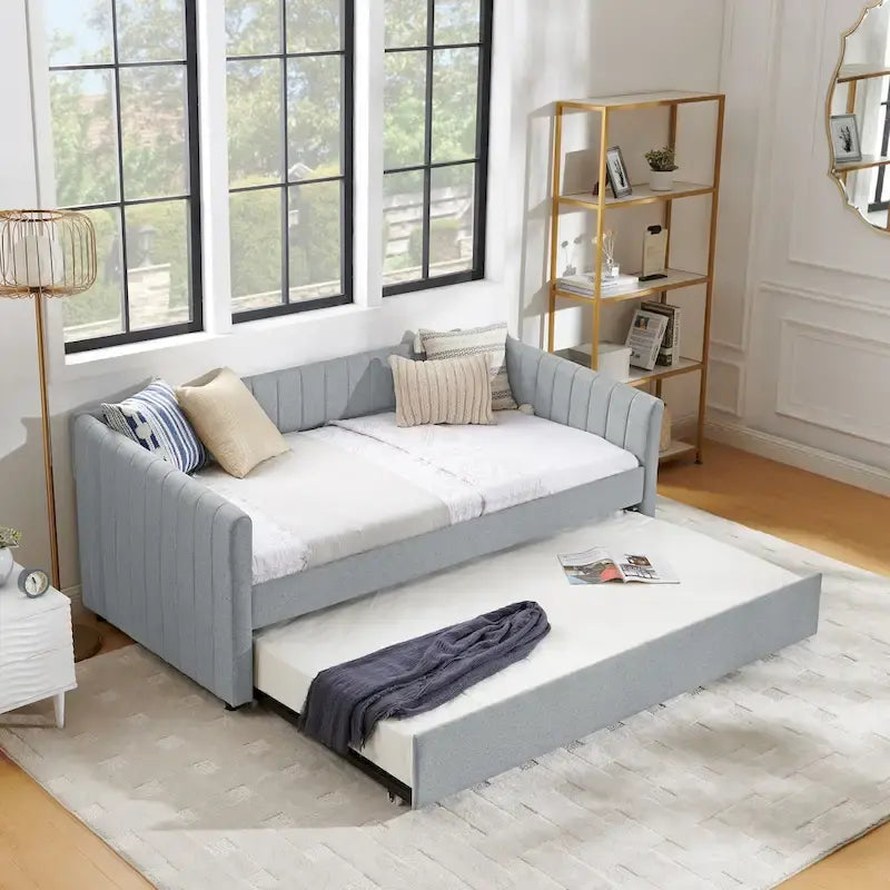 Lit de repos simple rembourré en lin gris avec détails à rayures verticales et lit gigogne coulissant – 1 personne