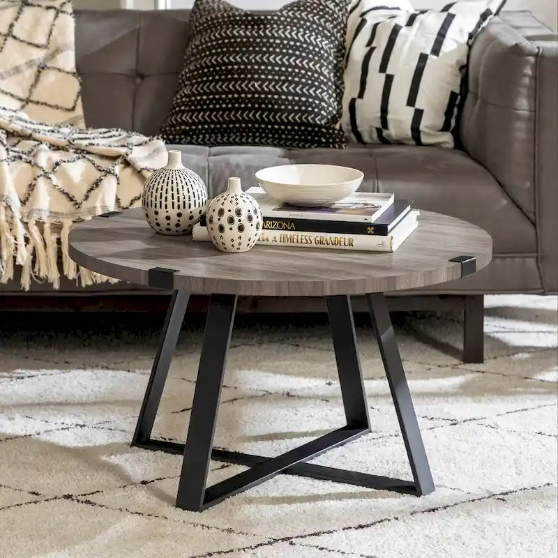 Table basse ronde à plateau aspect bois multi-finitions avec piètement en métal en croix