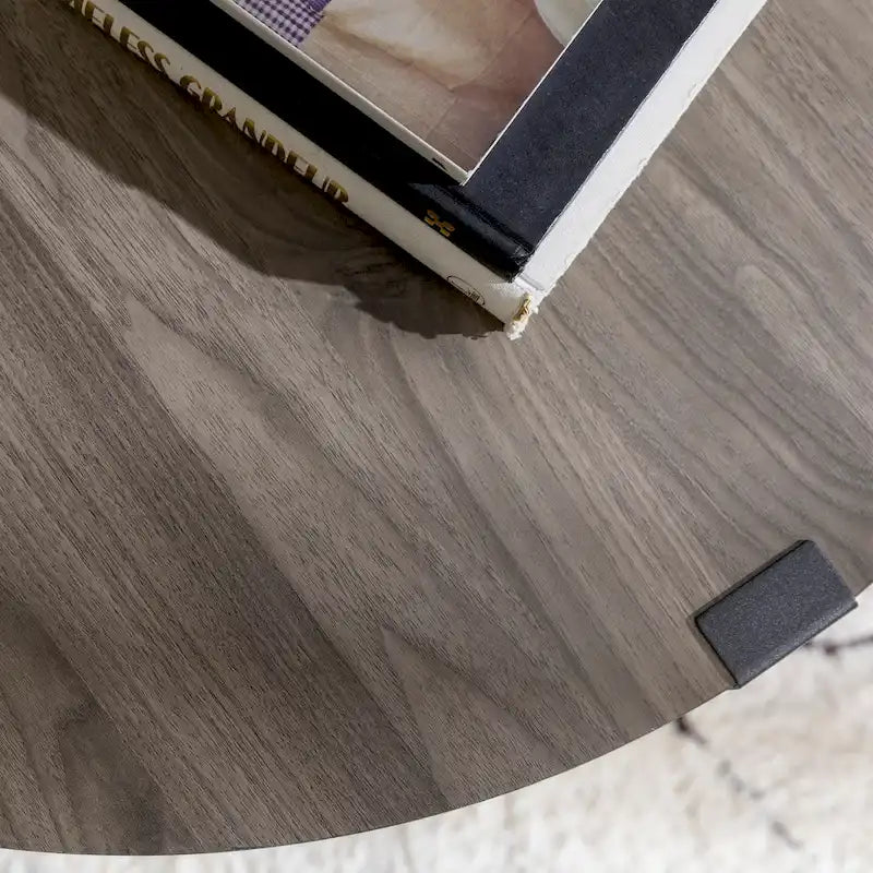 Table basse ronde à plateau aspect bois multi-finitions avec piètement en métal en croix