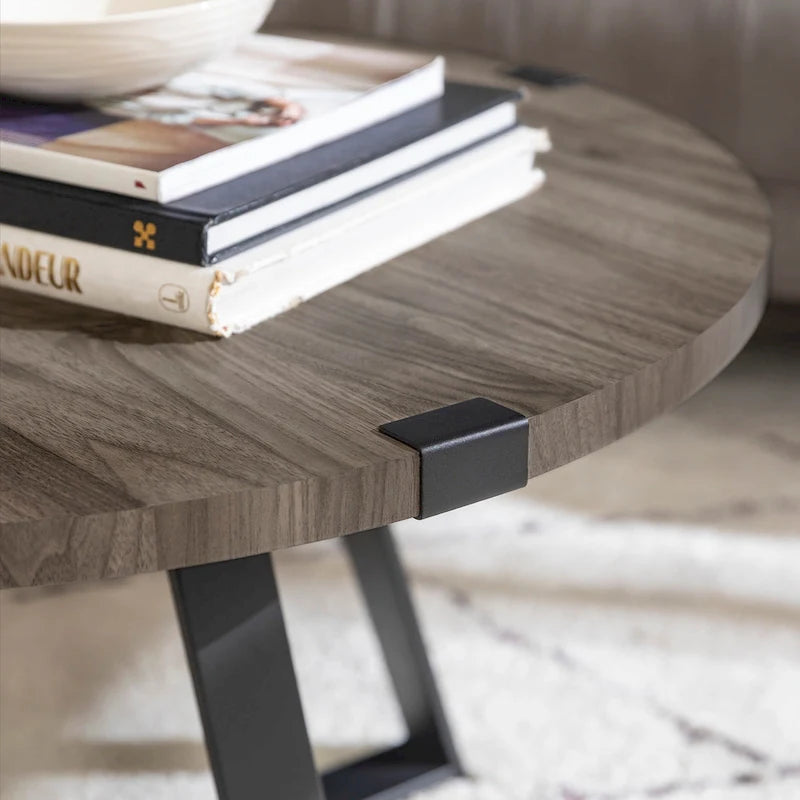 Table basse ronde à plateau aspect bois multi-finitions avec piètement en métal en croix