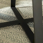 Table basse ronde à plateau aspect bois multi-finitions avec piètement en métal en croix