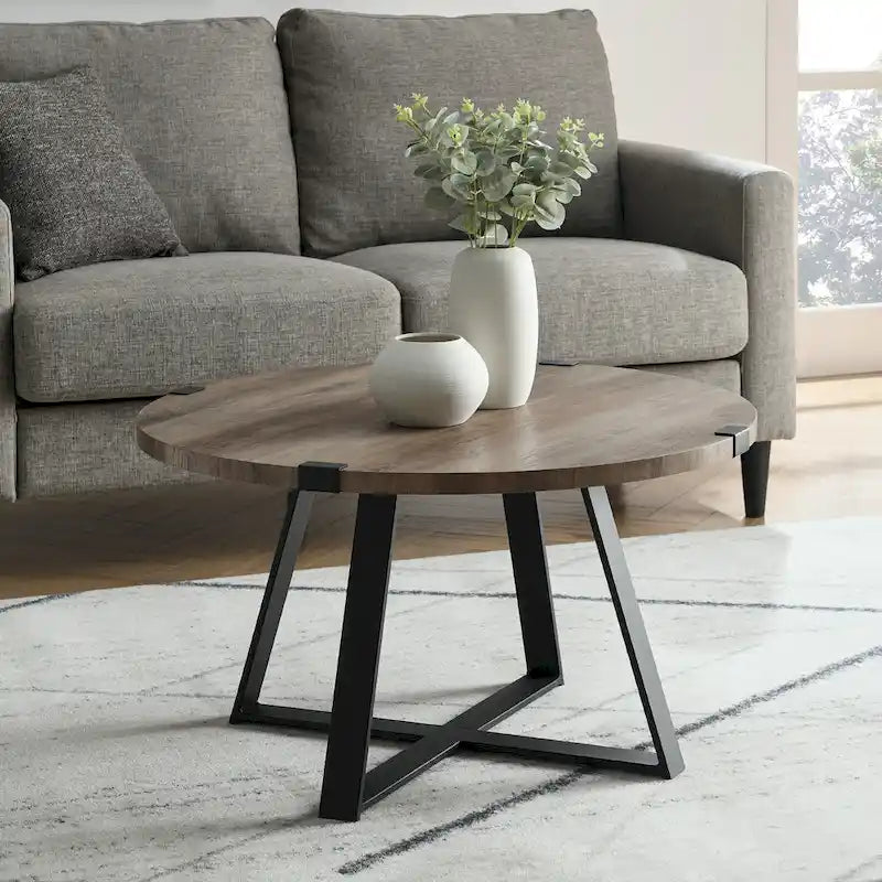 Table basse ronde à plateau aspect bois multi-finitions avec piètement en métal en croix
