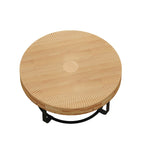 Table basse ronde sculptée en pin naturel et noir avec pieds en métal noir